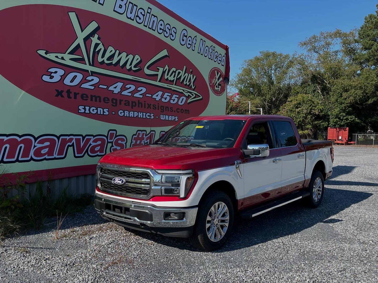 Red and white two-tone Ford F-150 vehicle wrap by Xtreme Graphix